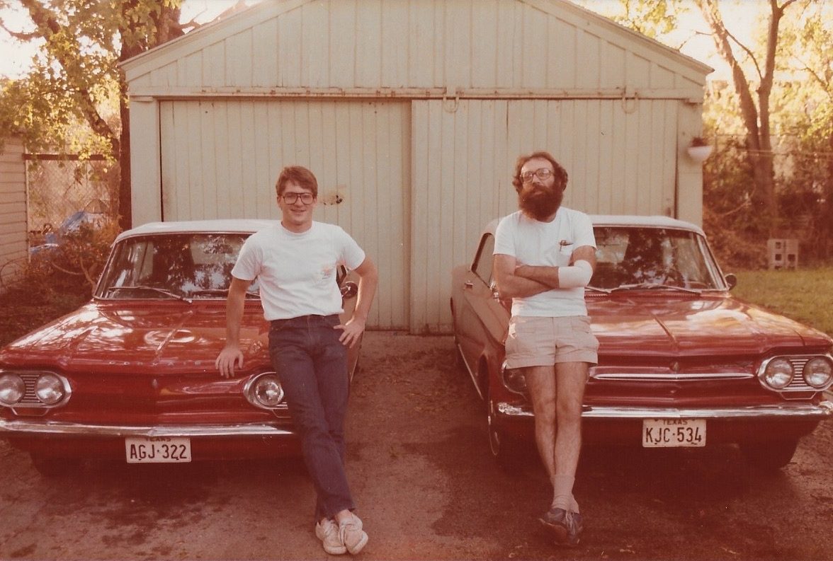 A young David Rogers with his father and their matching Corvairs